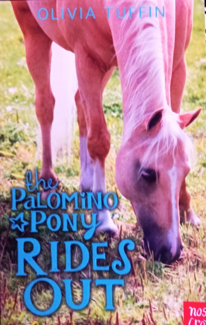 THE PALOMINO PONY RIDES OUT